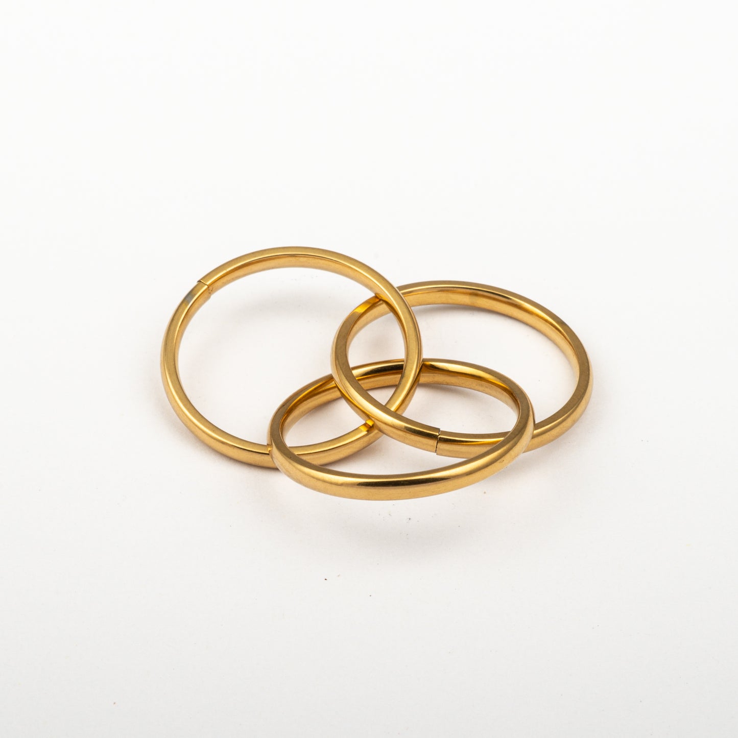 Anillo Anto-Estrés Deslizante Triple Julio Dorado