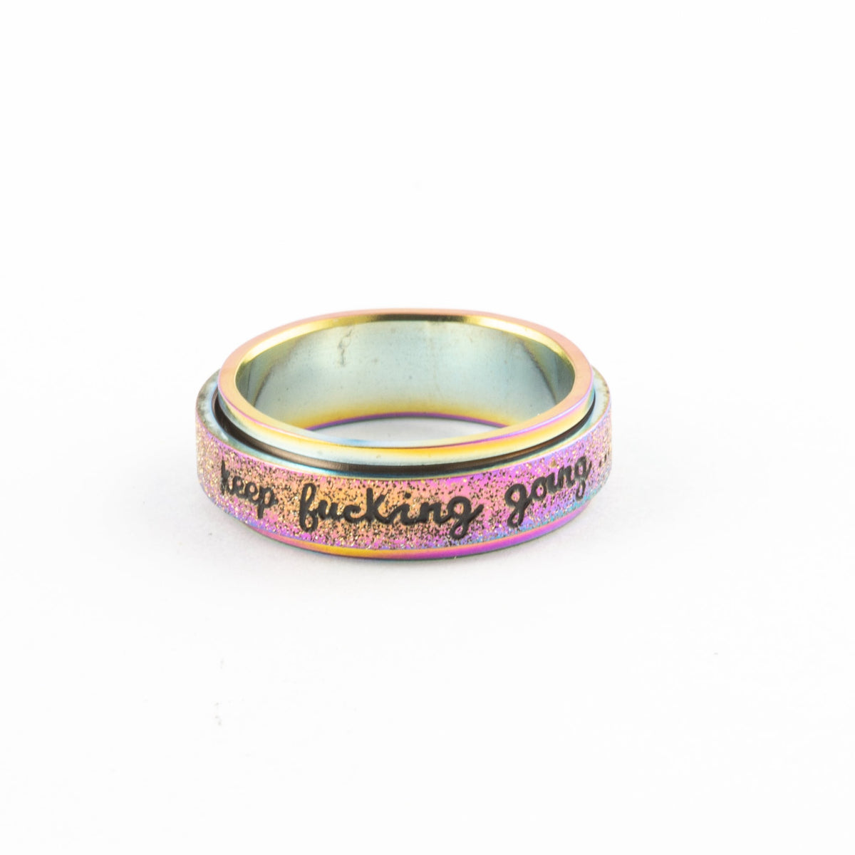 Anillo Anti-Estrés Deslizante Keep fuck*ng going Tornasol