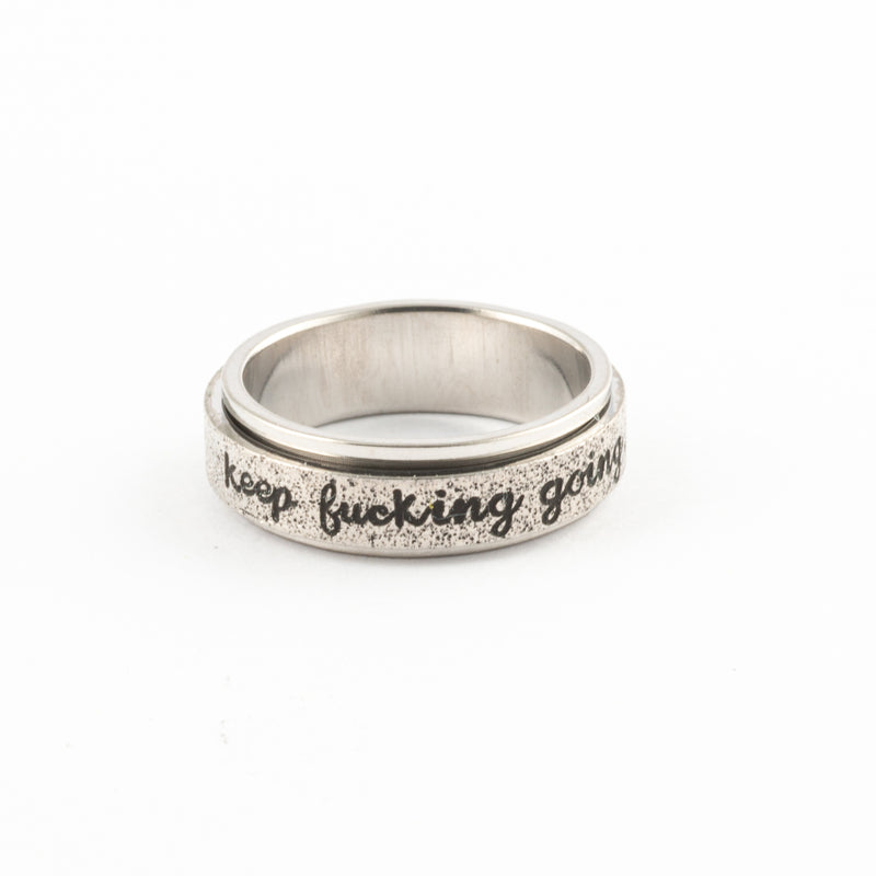 Anillo Anti-Estrés Deslizante Keep fuck*ng going Plateado