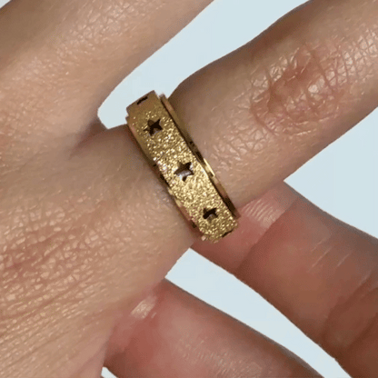 Anillo Deslizante Estrellas Aspero Dorado