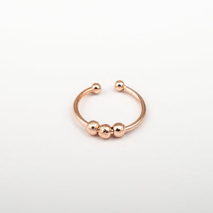 Anillo Anti-Estrés Deslizante Bolitas Julio Oro Rosa