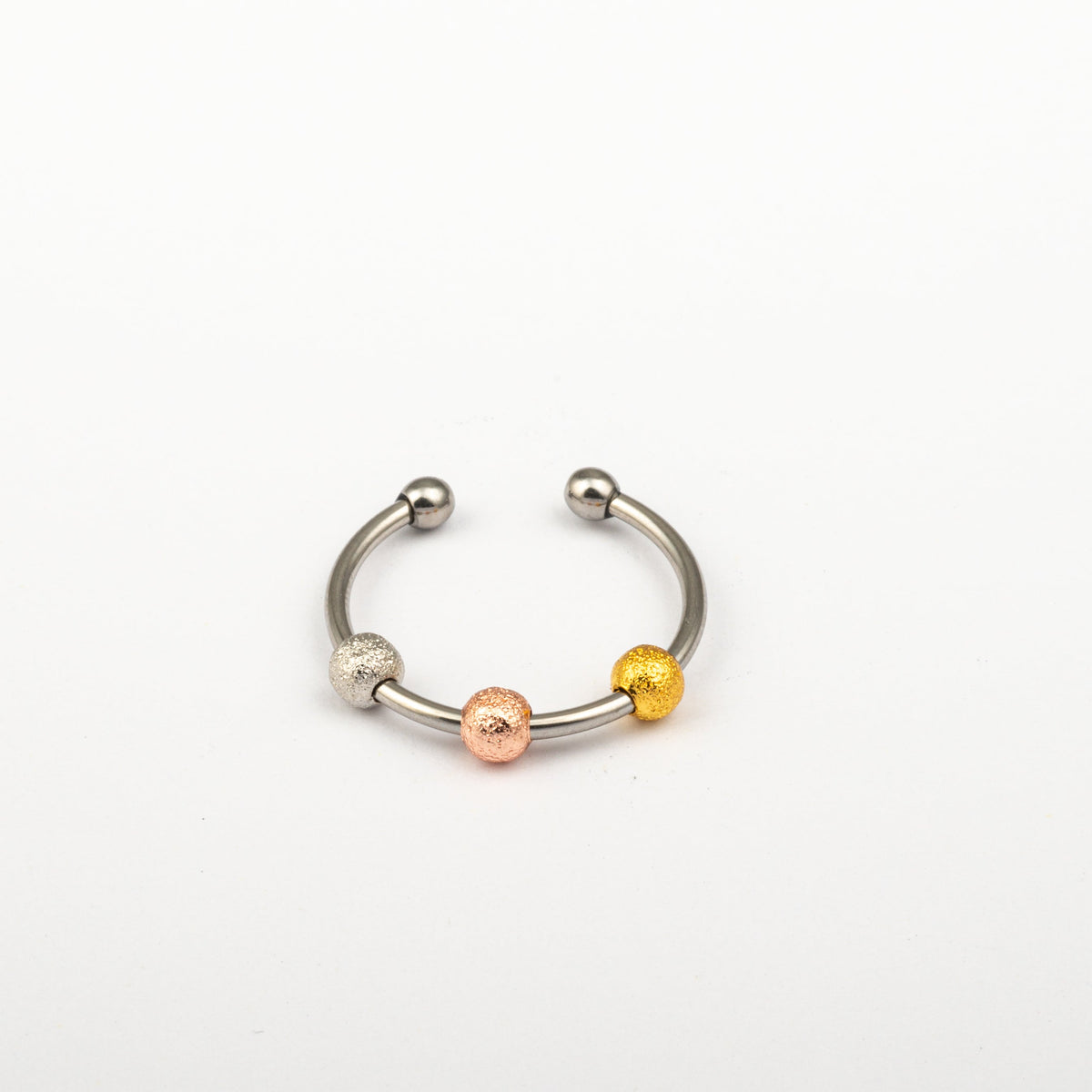Anillo Anti-Estrés Deslizante Bolitas Julio Tricolor
