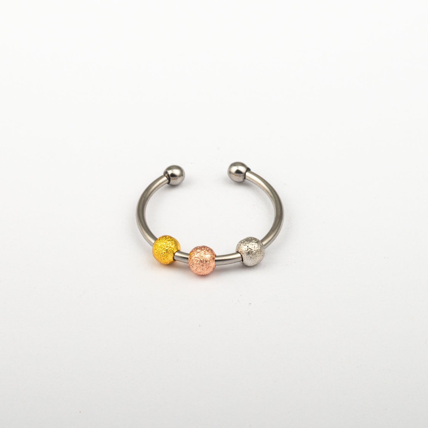 Anillo Anto-Estrés Deslizante Bolitas Julio Tricolor