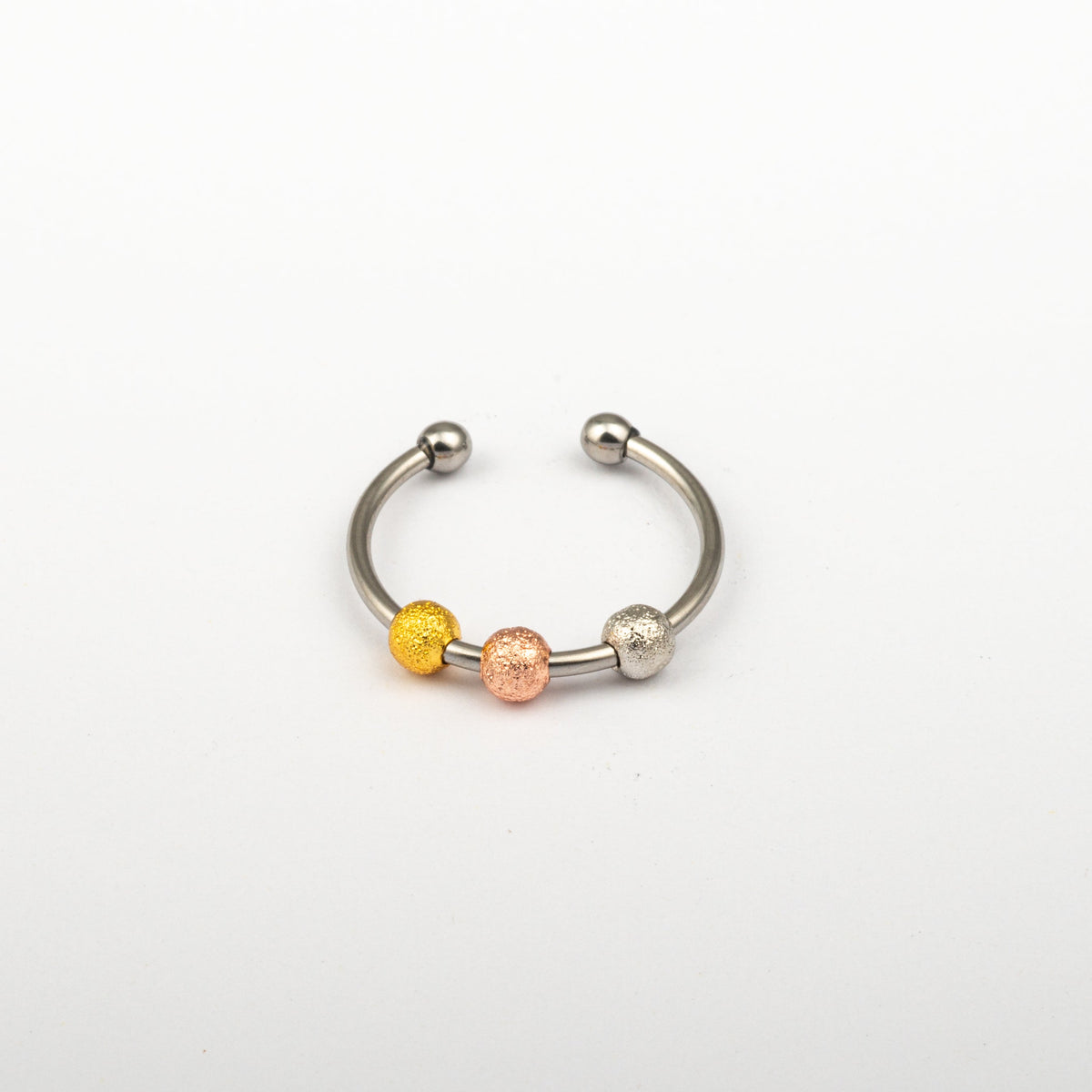 Anillo Anti-Estrés Deslizante Bolitas Julio Tricolor