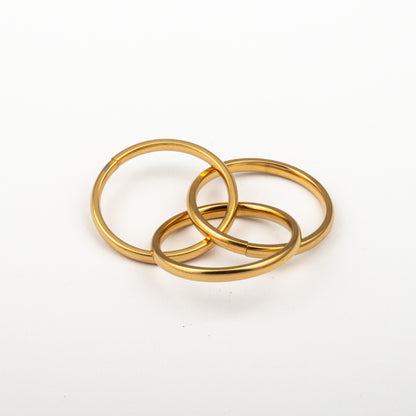 Anillo Anto-Estrés Deslizante Triple Julio Dorado