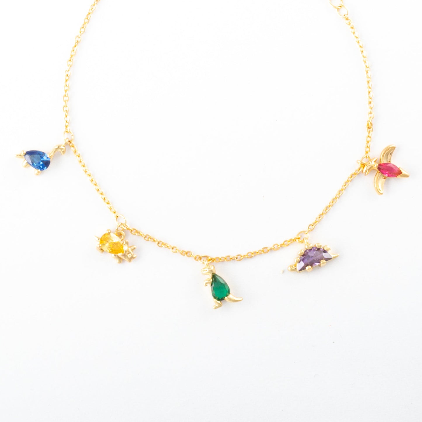 Pulsera Junio Dinosaurios Dorada - Agosto 18