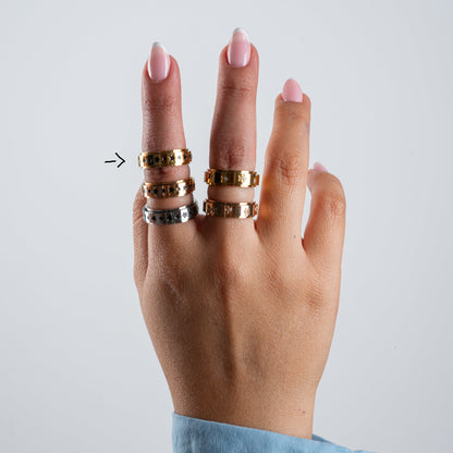 Anillo Deslizante Estrellas Negras Dorado