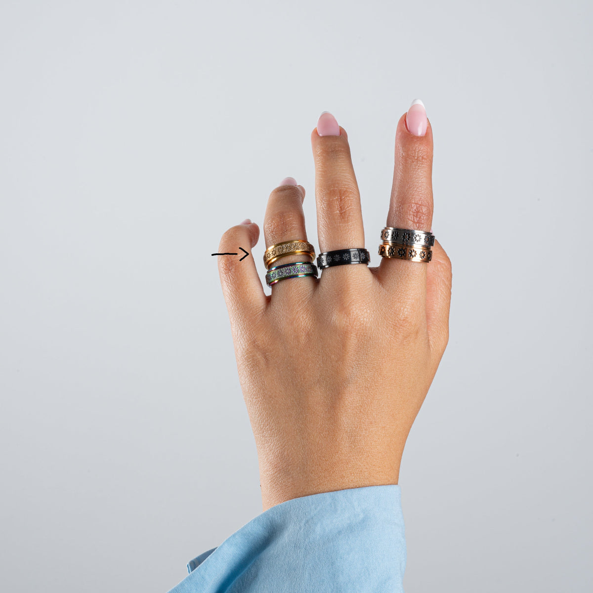 Anillo Anti-Estrés Deslizante Flores Aspero Dorado