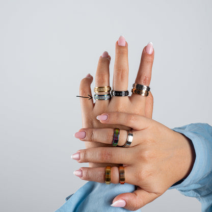 Anillo Anti-Estrés Deslizante Flores Aspero Tornasol