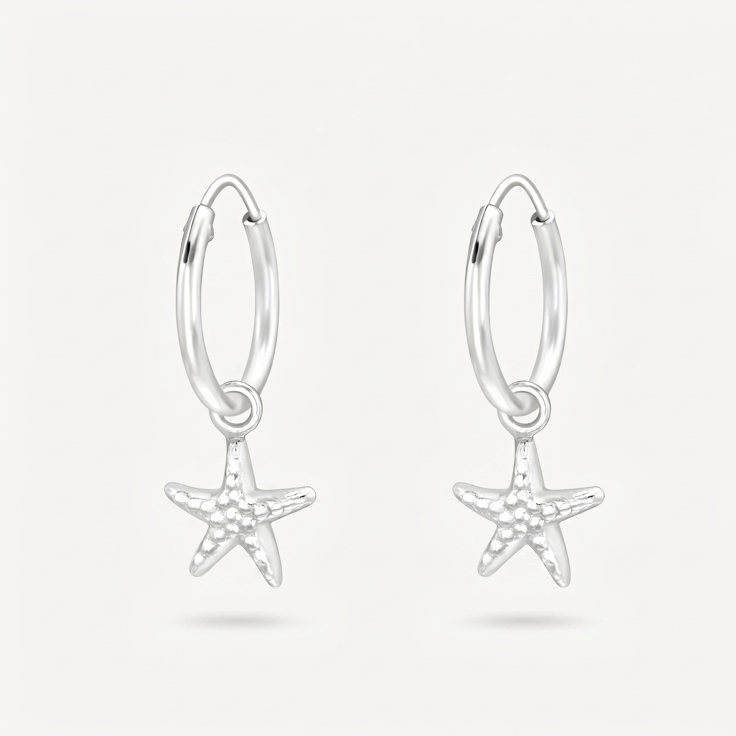 Aretes Estrella de Mar Plata S925