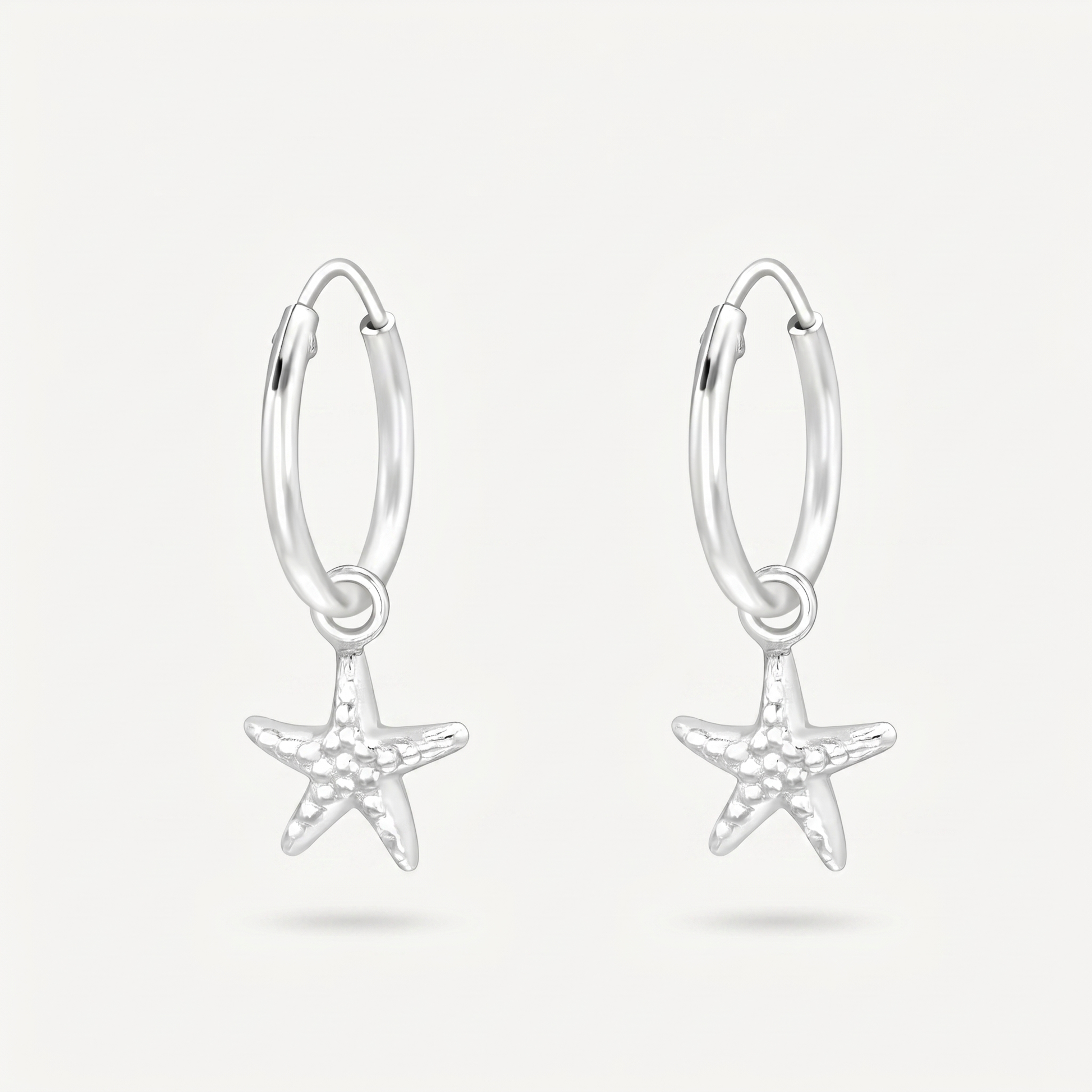 Aretes Estrella de Mar Plata S925