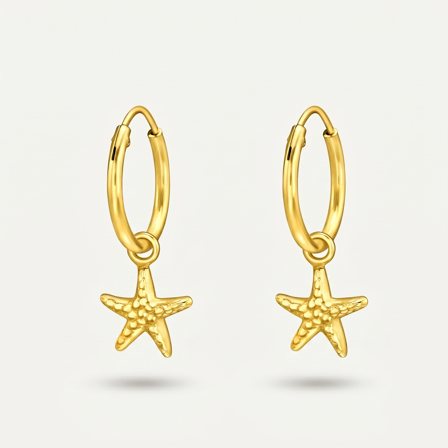 Aretes Estrella de Mar Dorados Plata S925