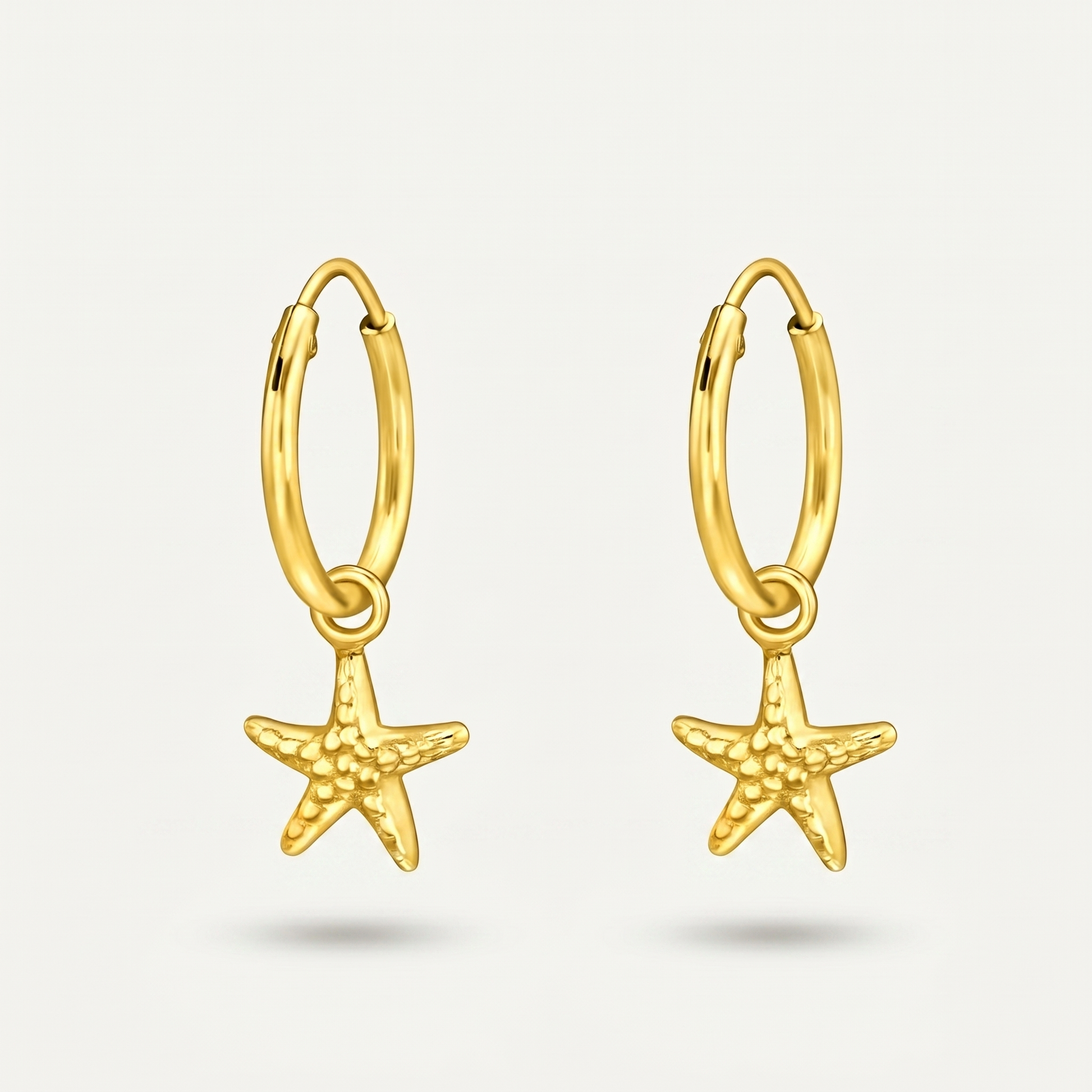 Aretes Estrella de Mar Dorados Plata S925